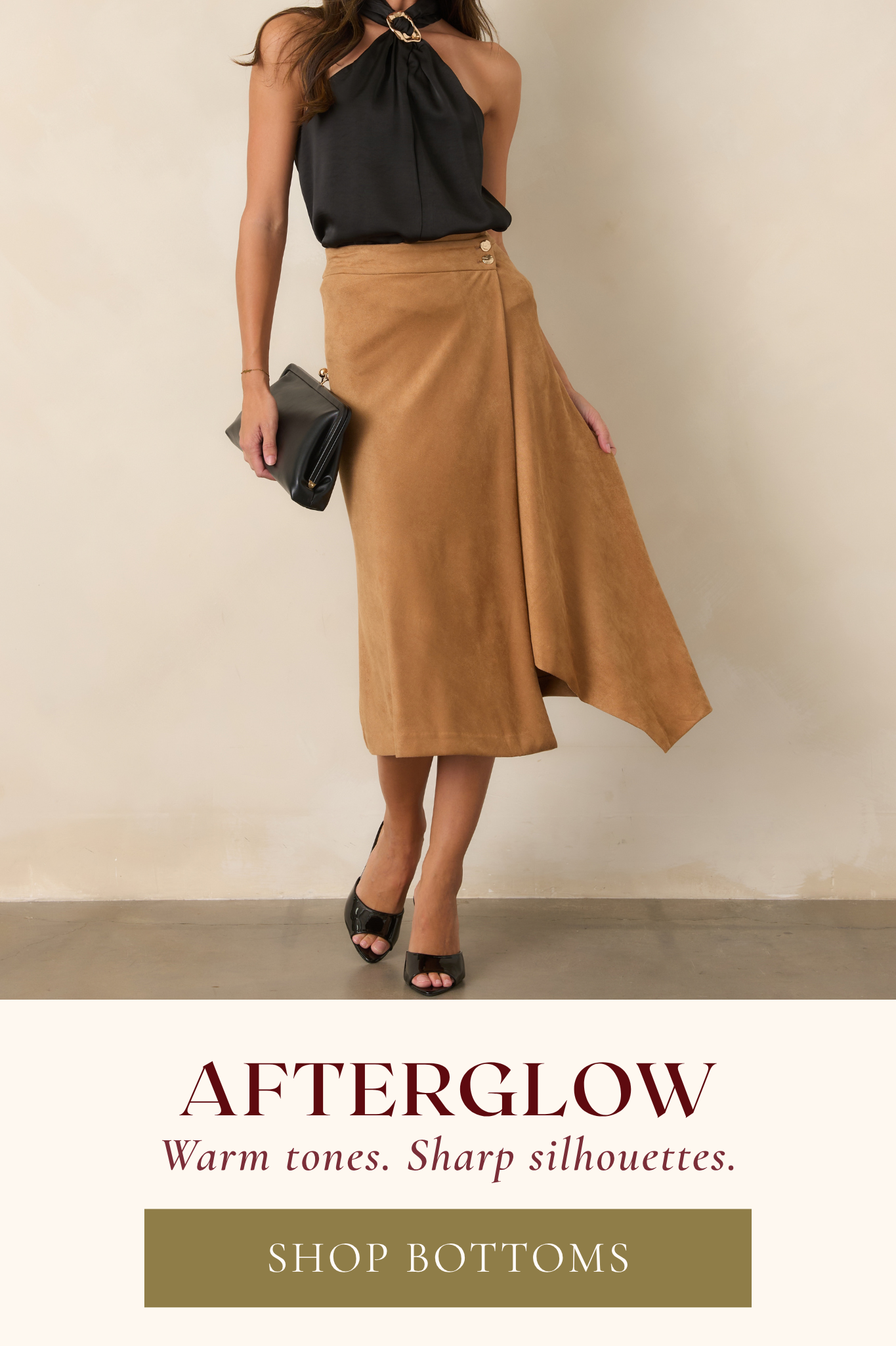 'Shop Bottoms.' Model wearing a brown suede midi skirt.