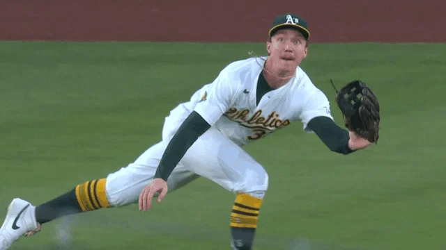 An animated gif of A's outfielder Henry Bolte making a diving catch
