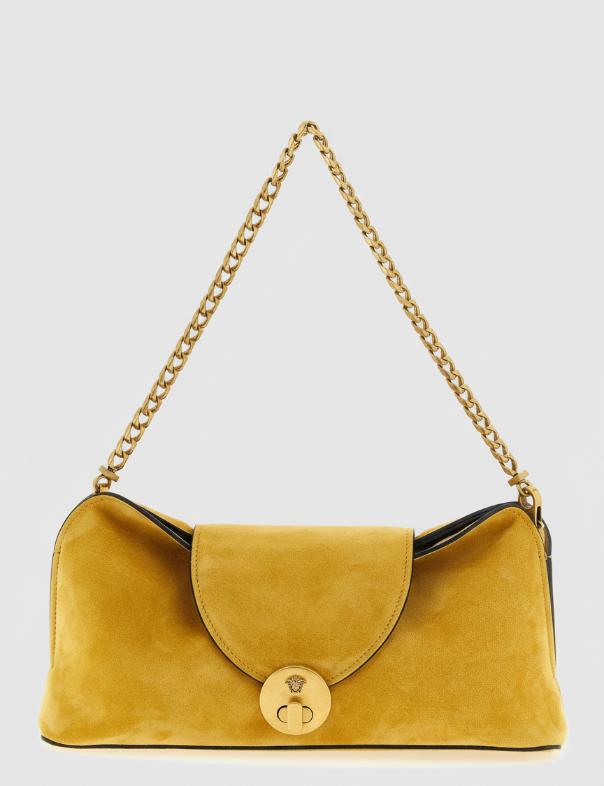 Yellow suede clutch with gold chain strap and Medusa clasp.