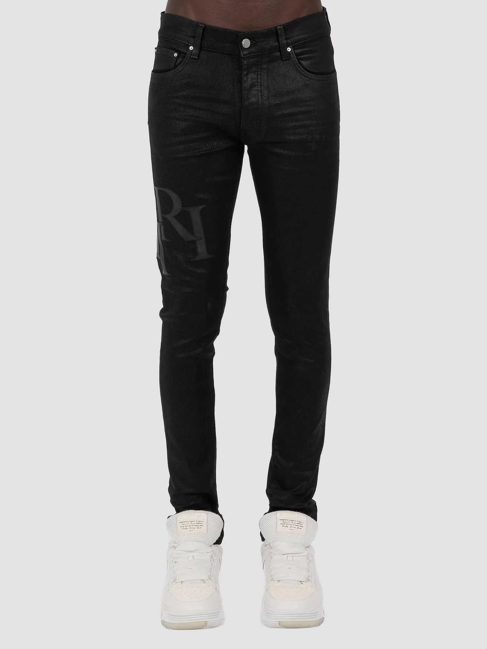 Amiri Staggered Logo Waxed Skinny Jeans